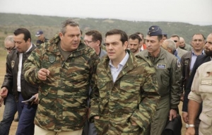 Prime minister Alexis Tsipras with Panos Kammenos, minister of Defence, in military uniforms.